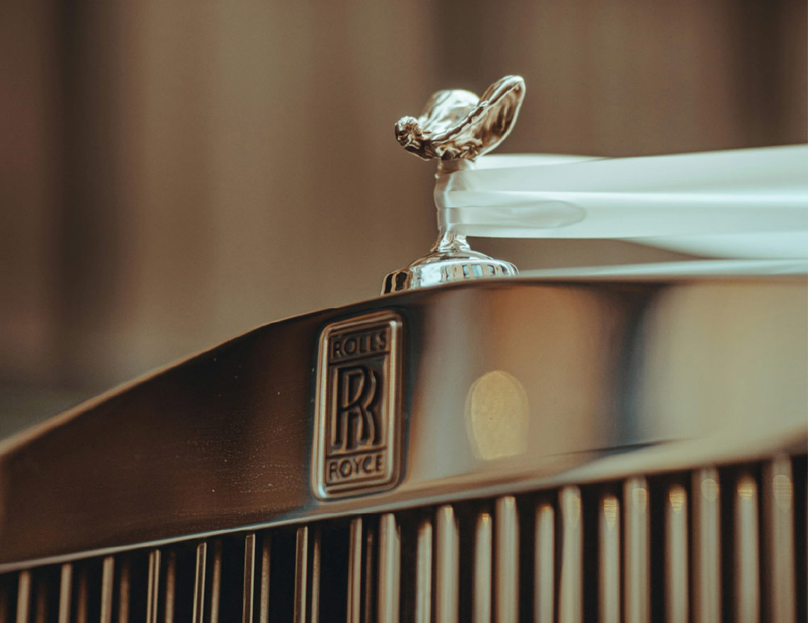 High quality close up of a chrome silver rolls Royce bonnet