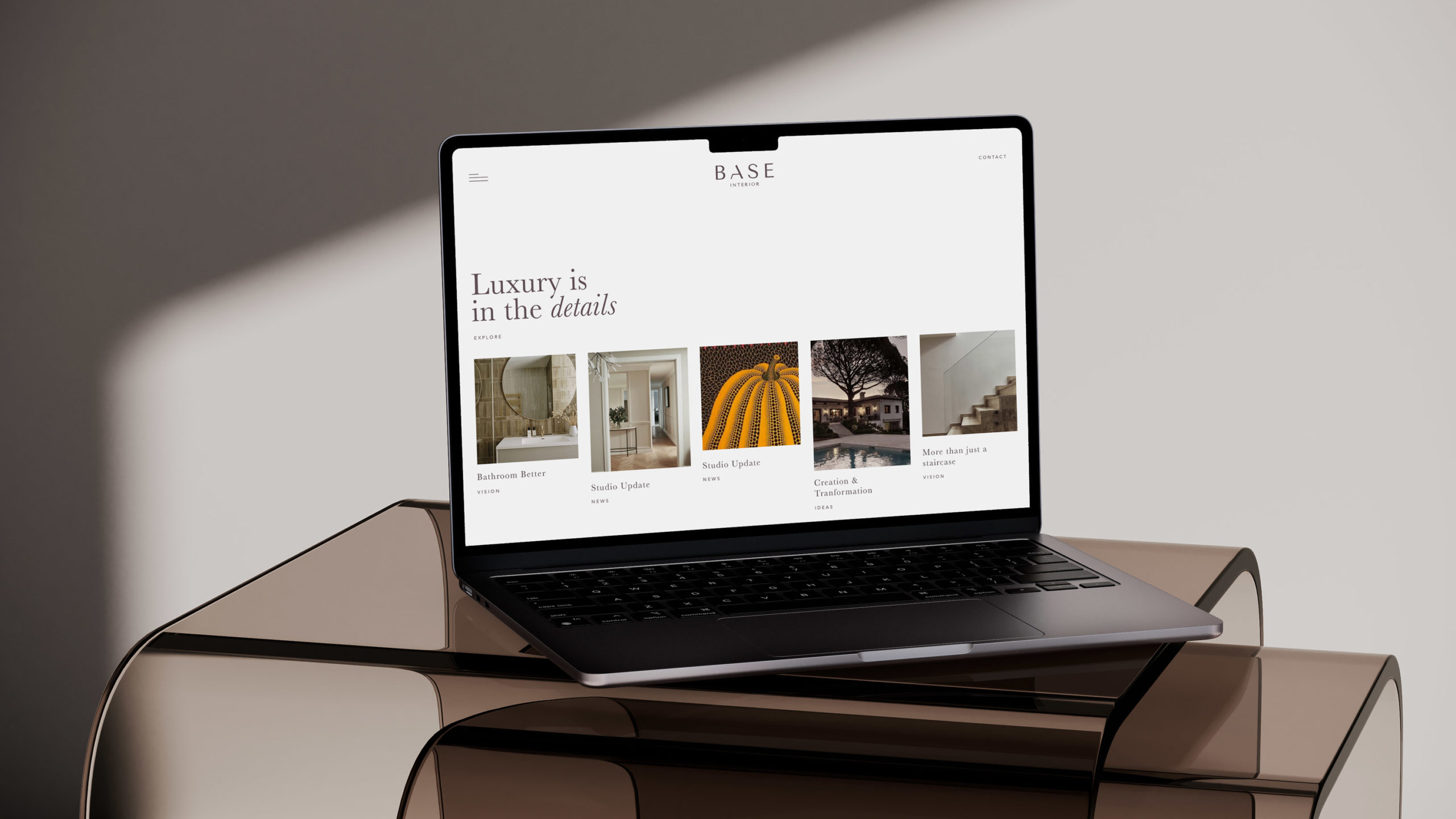 Base Interior client - desktop website design mocked up on laptop device