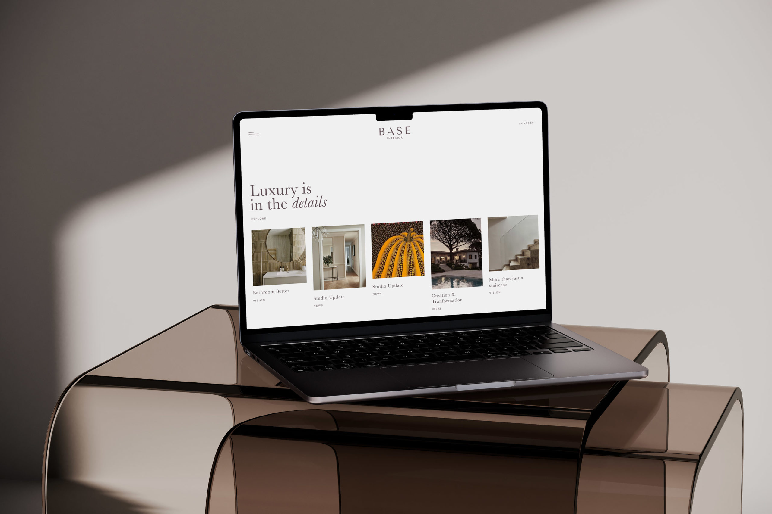 Base Interior client - desktop website design mocked up on laptop device