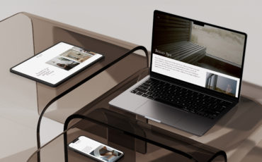 Base Interior client - desktop, tablet and mobile designs mocked up on devices
