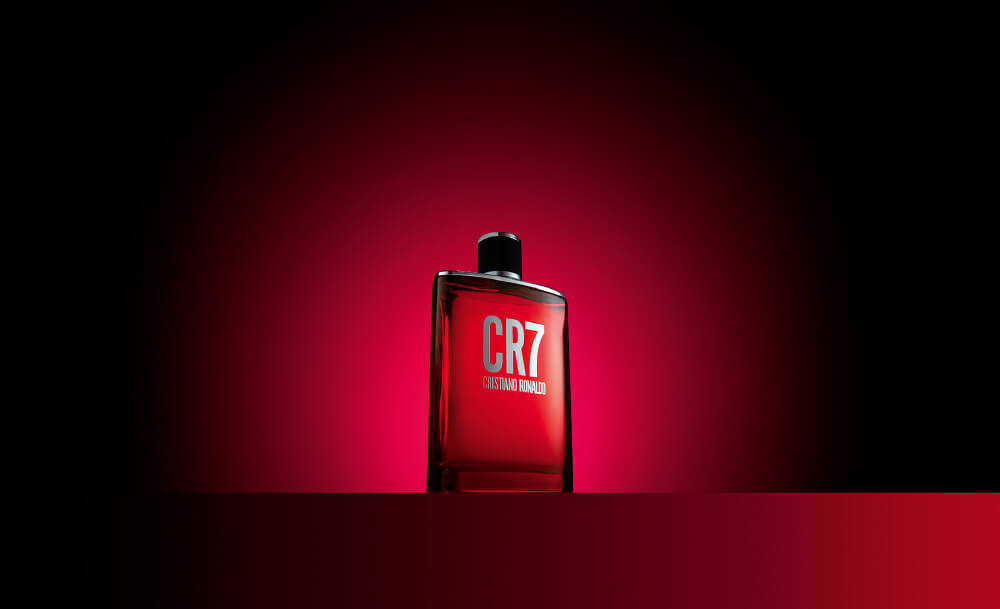 Image of Cristiano Ronaldo's CR7 fragrance with a red background