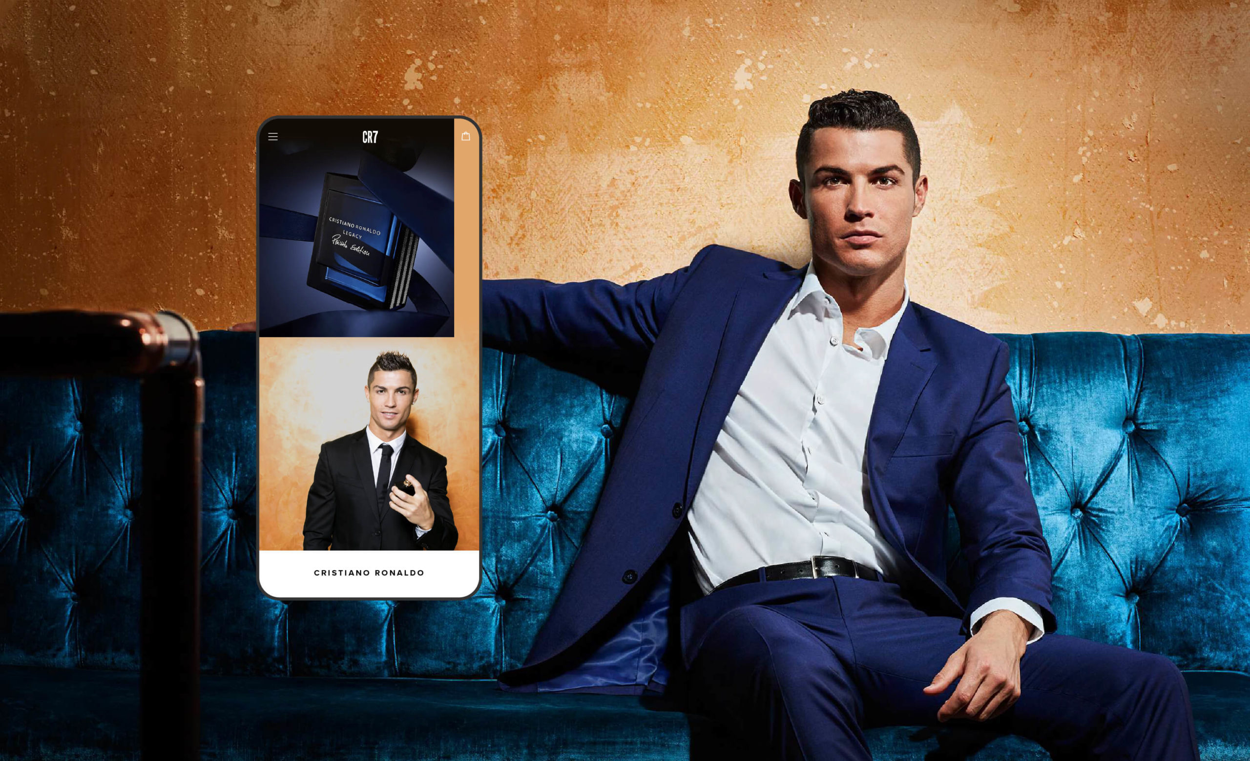 Cristiano Ronaldo on a turquoise sofa with a mobile phone displaying his premium CR7 fragrance